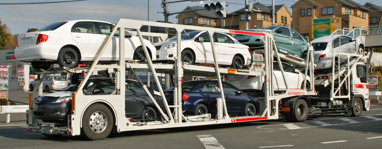 MKT Delivery — vehicle on carrier